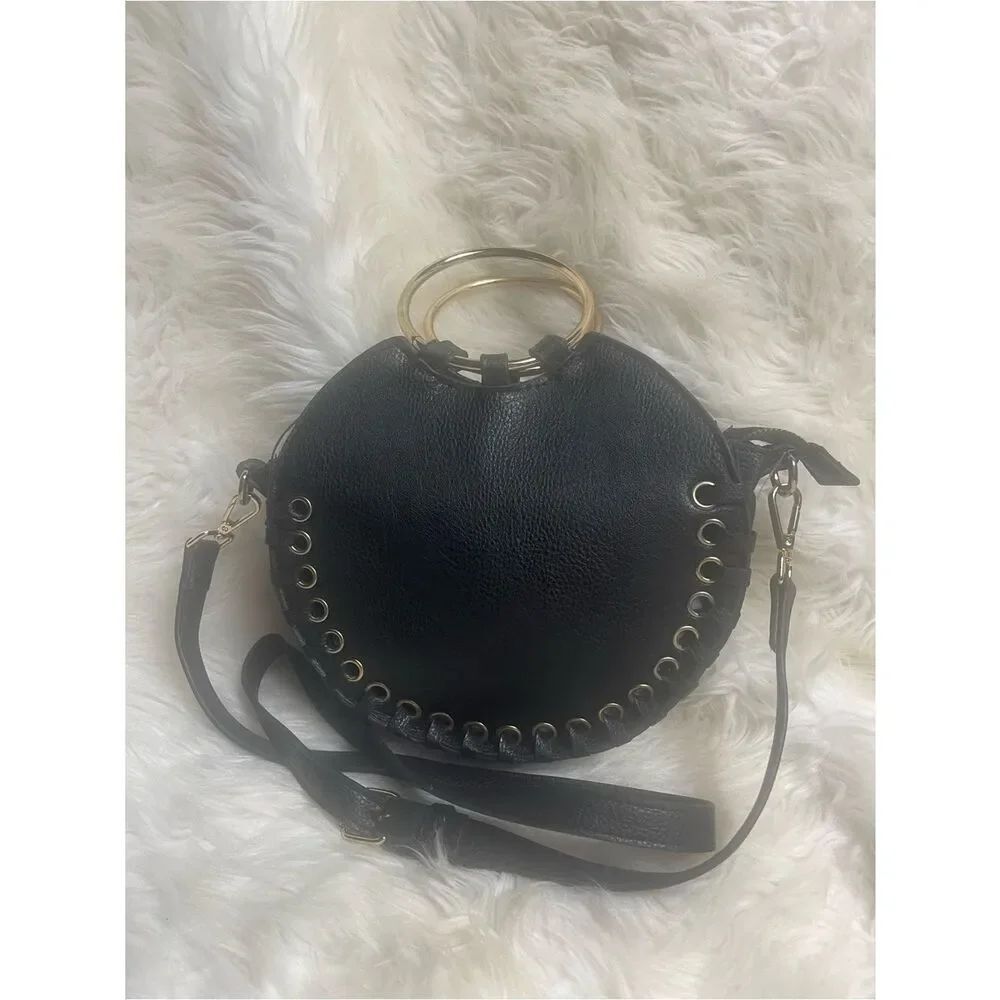 Carlos Santana syntheticBlack Round Leather Crossbody Bag with Gold Ring Handles